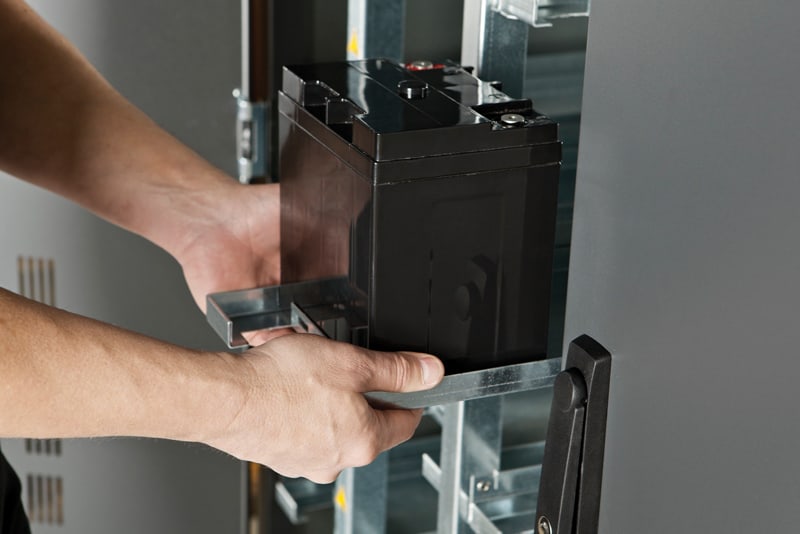 Battery-Replacement Battery being replaced